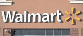  ?? SAUL LOEB/AFP/GETTY IMAGES ?? As of Feb. 1, it will no longer be “Wal-Mart Stores” as the retailer gets rid of the hyphen and drops “stores” from its legal name.