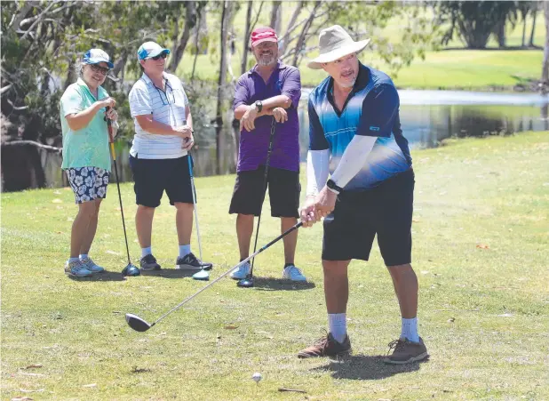  ?? Picture: ANNA ROGERS ?? PERFECTLY POISED: Nene Jose, Teresa McHardie and Peter Bell watch as Brandon Vigor tees off on the third hole at Half Moon Bay Golf Club.