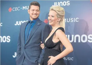  ?? THE CANADIAN PRESS FILE PHOTO ?? Michael Bublé says he relies on his wife, Luisana Lopilato, now that his son Noah is better.