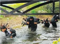  ?? THE ASSOCIATED PRESS FILES ?? ISIL recruits are shown going through training in northern Iraq in 2015. A recent study suggests that about a third of all Canadians who left the country to join ISIL were from Quebec.
