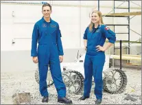  ?? CP PHOTO ?? Canada’s newest astronauts Jennifer Sidey and Joshua Kutryk visit the Rover room during a a tour of the Canadian Space Agency in Saint-hubert, Que., Tuesday.