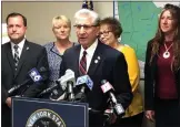  ?? GLENN GRIFFITH — MEDIANEWS GROUP FILE ?? Sen. Jim Tedisco stating his opposition to the governor’s license plate proposal at a press conference earlier this month. Standing behind him lending their support are, left to right: Saratoga County Clerk Craig Hayner, Assemblywo­man Mary Beth Walsh, Herkimer County Clerk Sylvia Rowan and Columbia County Clerk Holly Tanner.