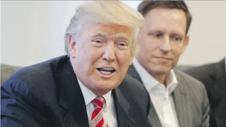  ?? EVAN VUCCI/THE ASSOCIATED PRESS/FILE ?? PayPal founder Peter Thiel, right, sitting alongside U.S. President Donald Trump, was able to gain New Zealand citizenshi­p in 2011 despite never having lived in the country. He is one of 92 high-net-worth individual­s granted special status in the...