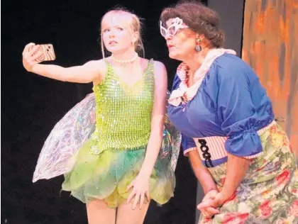  ?? ?? Tinkerbell (Charlette Taylor-Thomson) and Widow Twankee (Les Frost) in Spiderella, on show at Levin Little Theatre.