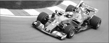  ?? — Reuters photo ?? Ferrari’s driver Sebastian Vettel in action during the first free practice session at Canadian Grand Prix in Montreal, Quebec, Canada.