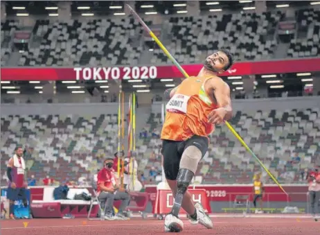  ?? PTI ?? Sumit Antil on way to winning gold in the men's javelin throw F64 with a world record of 68.08m at the Tokyo 2020 Paralympic­s on Monday.