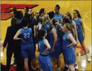  ?? KEV HUNTER/MEDIANEWS GROUP ?? North Penn huddles during its state playoff game with Freedom.