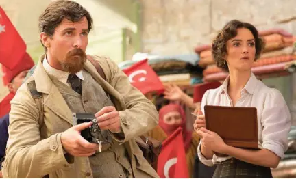  ?? Jose Haro/ Open Road Films “The Promise” stars Christian Bale and Charlotte Le Bon. The film has been pushed by A-list celebritie­s, including George and Amal Clooney and Kim Kardashian, who is of Armenian heritage. ??