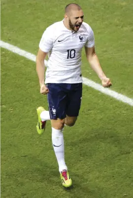  ?? Photo: AP ?? France’s Karim Benzema celebrates scoring his side’s fourth goal against Switzerlan­d