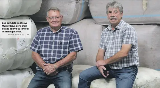  ?? PENNY WARDLE/STUFF ?? Bob Butt, left, and Steve Murray have done their best to add value to wool in a falling market.