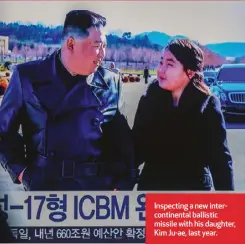  ?? ?? Inspecting a new interconti­nental ballistic missile with his daughter, Kim Ju-ae, last year.