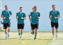  ?? NELSON ALMEIDA/AFP/GETTY IMAGES ?? Toni Kroos, Marco Reus, Thomas Mueller and Leon Goretzka go to work during Germamy’s training session at the Olympic Park Arena in Sochi this week.