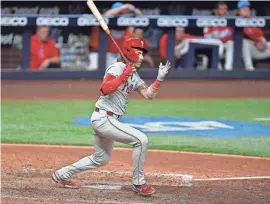  ?? MICHAEL LAUGHLIN/USA TODAY SPORTS ?? Philadelph­ia Phillies second baseman Bryson Stott hits a triple during the sixth inning against the Marlins on Saturday at loanDepot Park in Miami.