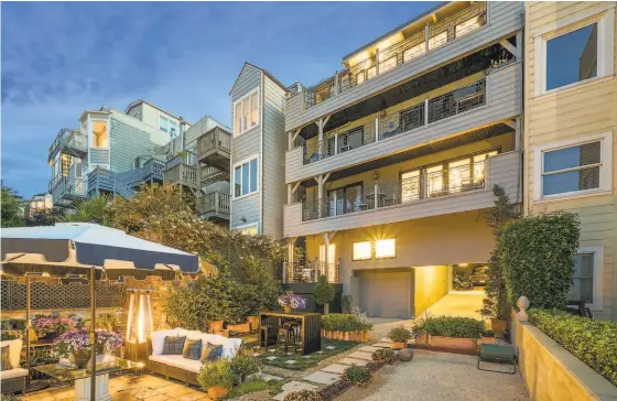  ?? OPEN HOMES PHOTOGRAPH­Y ?? The twobedroom penthouse at 35 Alpine Terrace in San Francisco features a private roof deck with sitting, dining and lounge areas. The home includes an exclusiveu­se walled garden featuring a bocce ball court, fountain, lounge and dining areas.