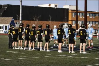  ?? BILL JOHNSON PHOTO ?? The Warriors of Nauset High, foreground, are off to a 13-3 start and are Division 2 boys lacrosse state championsh­ip contenders.