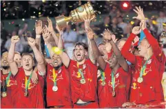  ?? AFP ?? Leipzig midfielder Dominik Szoboszlai lifts the trophy after their team won the German Cup on Saturday night.