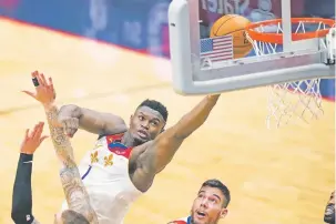 ?? GERALD HERBERT/ASSOCIATED PRESS FILE PHOTO ?? Pelicans forward Zion Williamson is one of four first-time All-Stars, all revealed Tuesday.