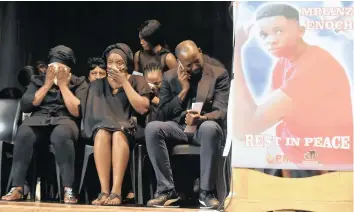  ?? African News Agency (ANA) ?? ANTO Mpianzi, centre, mother of Enock, with family members during the memorial service of the Grade 8 learner who drowned at the Nyati Camp outside Brits in the North West. | ITUMELENG ENGLISH