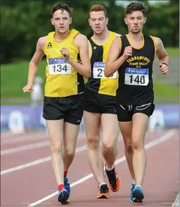  ??  ?? Niall Prendivill­e, right, Farranfore Maine Valley AC, during the Men’s 10,000m Walk event