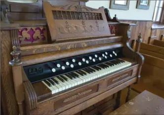  ?? IAN STEWART, SPECIAL TO THE RECORD ?? The old organ was replaced with a more modern model for easier playing.