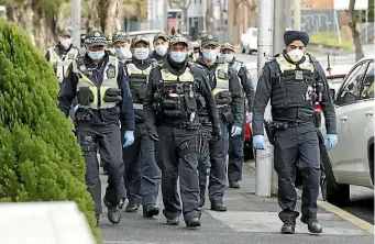  ?? NINE ?? About 500 police are patrolling the locked down towers in North Melbourne and Flemington.