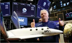  ??  ?? Sir Richard Branson poses at the New York stock exchange before trading opens. Photograph: Brendan McDermid/Reuters