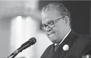  ?? BARBARA J. PERENIC/COLUMBUS DISPATCH ?? Bishop Jerry Pierce pauses while speaking at a memorial gathering for Robert “Babachu” Spriggs, whom he called the “Fred Astaire of Goodale Park.”