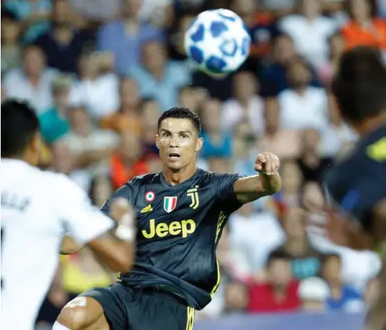  ?? FOTO: ALBERTO SAIZ, AP/NTB SCANPIX ?? Når Ronaldo spiller Champions League, er det mange som faller for fristelsen og ser fotballkam­per fra kanaler på nett som ikke har rettighete­r til å sende. Hvis du vet at du bruker en ulovlig side, kan du nå bli straffet for det.