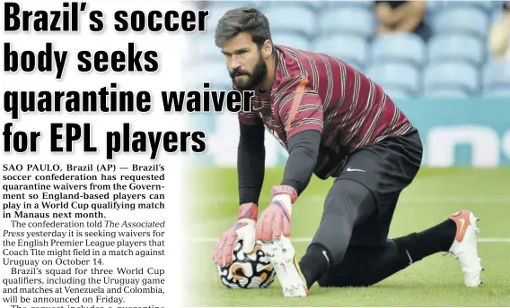  ?? (Photo: AP) ?? Liverpool’s goalkeeper Alisson stretches during warm-up before the English Premier League soccer match between Leeds United and Liverpool at Elland Road, Leeds, England, on Sunday, September 12, 2021.