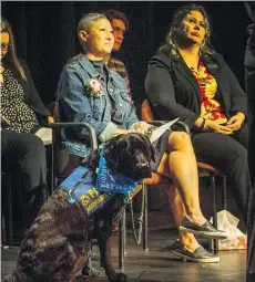  ?? ARLEN REDEKOP ?? Juliet Walden and Stark attend the Pacific Assistance Dogs Society graduation ceremony on Sunday.