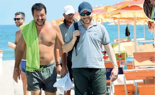  ?? (Lapresse) ?? Al mare Il ministro dell’interno Matteo Salvini, 45 anni, a Milano Marittima con il ministro della Famiglia Lorenzo Fontana, 38, e, nel tondo, con la compagna Elisa Isoardi, 35