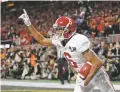  ?? AP FILE PHOTO ?? Alabama wide receiver DeVonta Smith celebrates his touchdown during the College Football Playoff championsh­ip Jan. 8 against Georgia in Atlanta. The AP preseason Top 25 is out, and for the third straight year Alabama is No. 1.