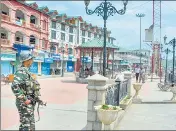  ?? PTI FILE ?? A security person stands guard during a strike called by the joint Hurriyat leadership in Srinagar on April 23, 2019.