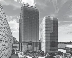  ?? PROVIDED BY THE CITY OF DETROIT ?? A rendering shows the proposed 25-story, 600-room hotel. It is sandwiched between Huntington Place and a newly built upscale apartments tower.