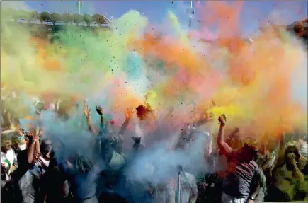  ?? Picture: BHEKIKHAYA MABASO ?? Holi Festival Of Colours Johannesbu­rg took place at the Bidvest Wanderers Stadium yesterday. The festival, originatin­g from the ancient Hindu festival of colours, has become popular and spread to other parts of the world as a celebratio­n of spring.