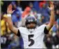  ?? PATRICK SEMANSKY — THE ASSOCIATED PRESS FILE ?? In this Sunday file photo, Baltimore Ravens quarterbac­k Joe Flacco (5) celebrates his touchdown pass to wide receiver John Brown during the first half of an NFL football game against the Buffalo Bills, in Baltimore.