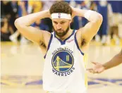  ?? EZRA SHAW/GETTY ?? Warriors’ Klay Thompson reacts during the third quarter of Game 1 against the Celtics on Thursday at Chase Center in San Francisco, California.