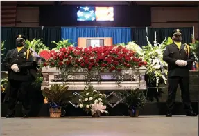  ?? (Arkansas Democrat-Gazette/Stephen Swofford) ?? Officers flank fallen officer Kevin Collins’ casket Saturday at his funeral. His cousin Jimmy Cunningham said Collins was a Pine Bluff superhero. “You don’t have to go to Wakanda to find Black Panther,” he said.