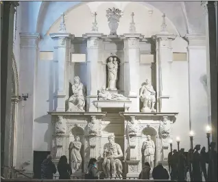  ??  ?? Visitors admire the tomb of Pope Julius II with the central marble statue of Mose, made by Italian sculptor Michelange­lo Buonarroti between 1505 and 1545, in the San Pietro in Vincoli church in Rome.