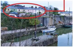  ?? ?? Picturesqu­e: Sailing boats at the harbour at Charlestow­n, with the homes of some of those hit by the parking furore circled