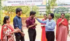  ?? B. VELANKANNI RAJ ?? Students celebratin­g their CBSE Class XII results at Anna Nagar in Chennai on Friday.