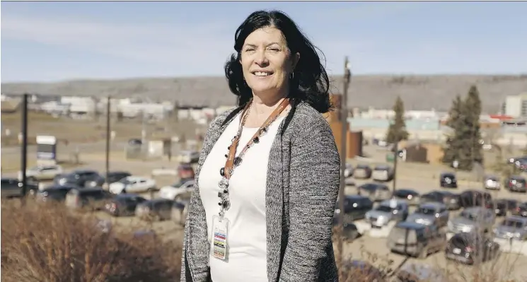  ?? PHOTOS: IAN KUCERAK ?? Dr. Sandra Corbett, who oversees mental health services in Fort McMurray for Alberta Health Services, says there has been a steady demand for counsellin­g and other services since last year’s wildfire. Corbett’s team has added more outreach staff and...