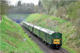  ?? Mark Pike ?? Hastings Diesels preserved seven-coach Class 201 diesel-electric multiple unit 1001 exits Buckhorn Weston Tunnel, near Gillingham, working 1Z15, the 14.40 Exeter Central to Hastings ‘Cogload Climber’ charter, on April 6.