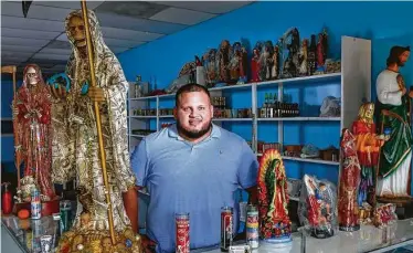  ?? Steve Gonzales / Staff photograph­er ?? Robert Garza, owner of Yerberia La Santa Fe, said many of his customers lack access to health care. Mystical shops have seen business skyrocket as the spirituall­y-oriented rely on them for comfort during the pandemic.