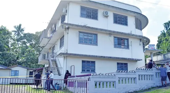  ?? Photo: Ronald Kumar ?? Police outside the Suva Apartments , where the body of 25-year-old woman was found on April 25, 2024.