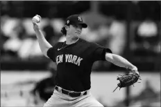  ?? ASSOCIATED PRESS ?? IN THIS MARCH 5 FILE PHOTO, New York Yankees starting pitcher Gerrit Cole throws during a spring training game against the Detroit Tigers in Lakeland, Fla.