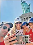  ?? ?? Luna and her chicks, left; Mario Portillo and his family watch from New York, above, and the Netherland­s bar, below