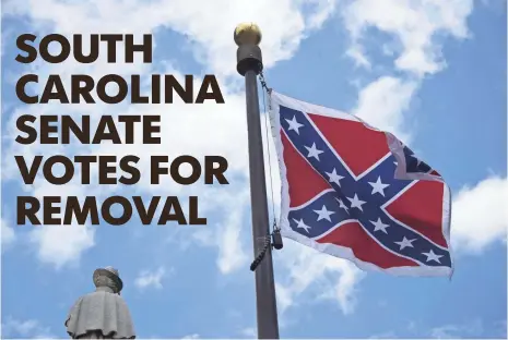  ?? JIM WATSON, AFP/GETTY IMAGES ?? South Carolina Gov. Nikki Haley called for the removal of the Confederat­e battle flag, which flies on Statehouse grounds.