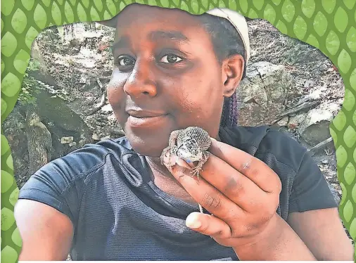  ?? COURTESY OF EARYN MCGEE ?? Earyn McGee, a Ph.D. candidate at the University of Arizona who was named to Forbes’ 30 Under 30 scientists list in December 2020, poses with a lizard during field research.