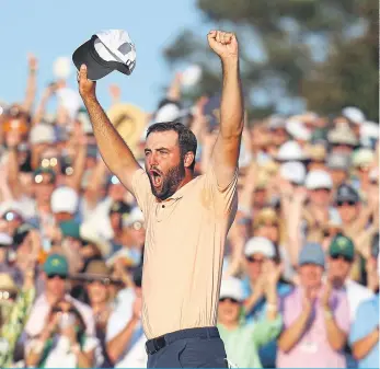  ?? ?? UNBEATABLE: The unflappabl­e Scottie Scheffler finally sets his emotion free after a four-shot victory gave him a second green jacket in three years at Augusta.